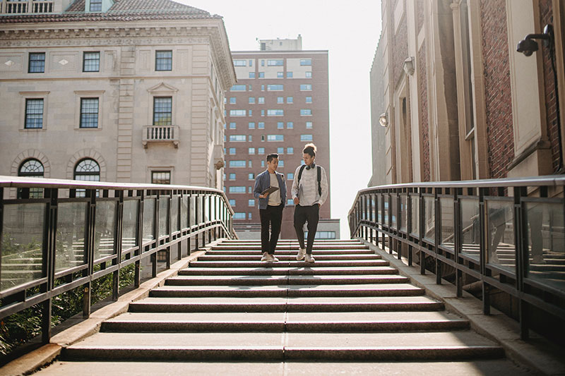 student accommodation two students walking in the city